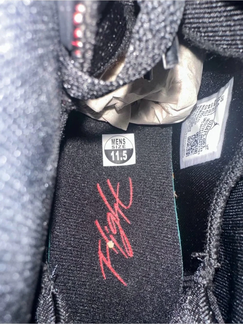 Jordan Black High-Top Sneakers with Red Heel Pull